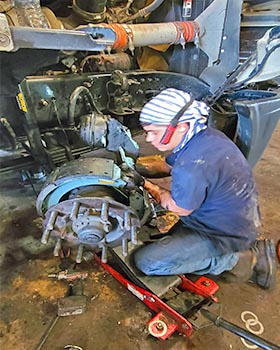 Air brake chamber and slack adjuster inspection on a heavy-duty truck in Dallas